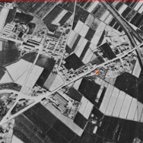 1943-Foto-Aerea Foto Aerea del quartiere S.Donato nel 1943: Si nota la ferrovia e a meta' verso il basso la caserma 6^ ORA. La stella rossa indica dove sara' costruita la Casa...